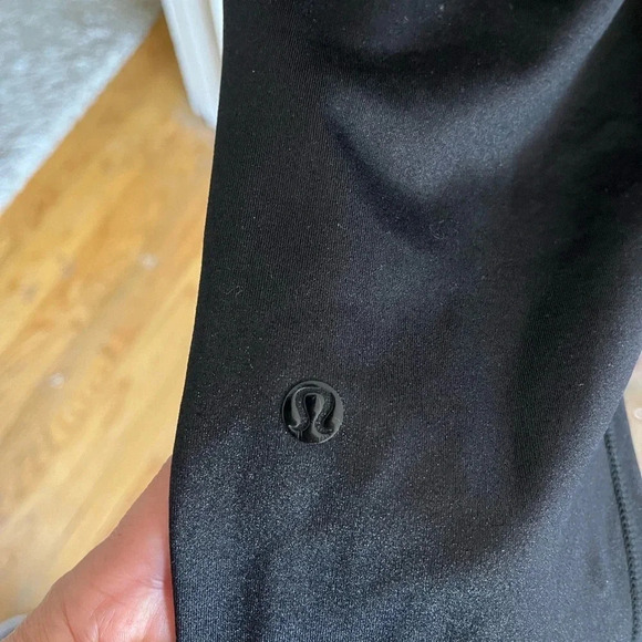 Lululemon black joggers with drawstring elastic waist band, and hemline. Size 4 - Picture 5 of 13